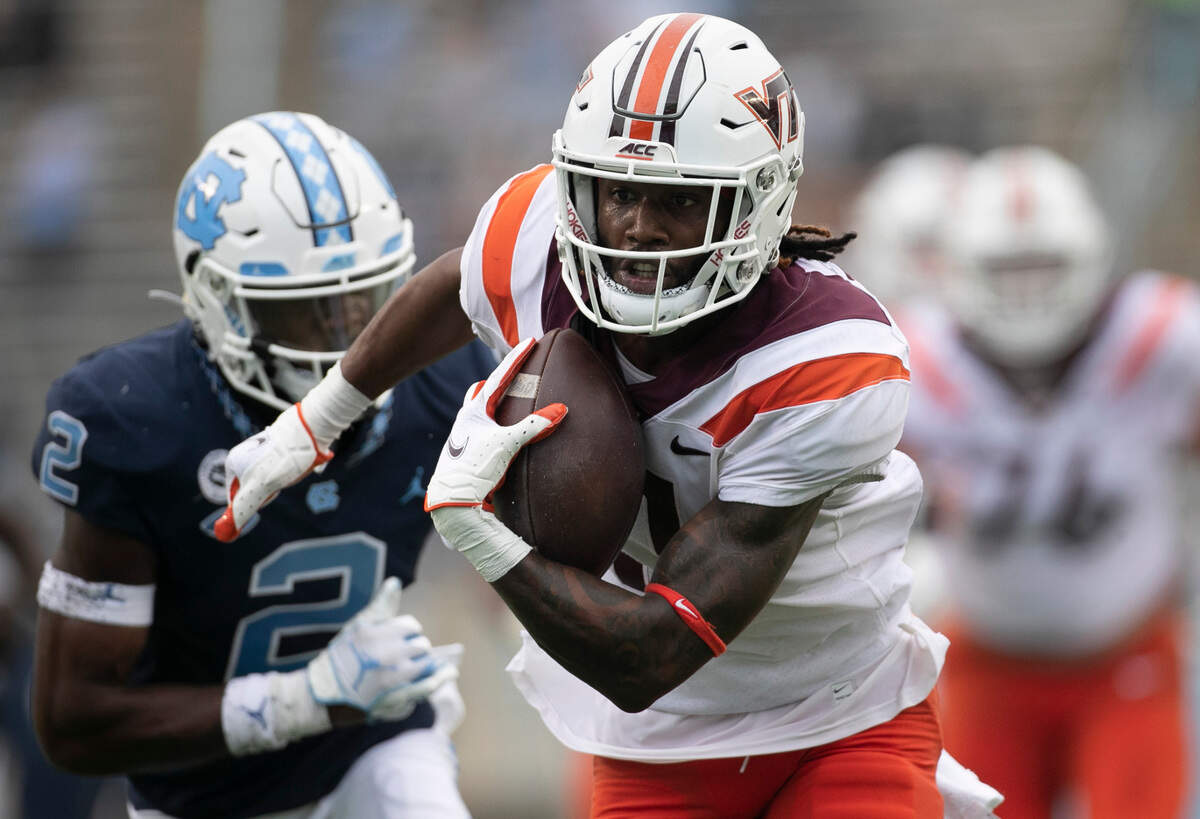 Virginia Tech’s Tre Turner (11) breaks open for a 29-yard gain after a pass reception from quarterback Hendon Hooker in the their quarter against North Carolina on Saturday, October 10, 2020 at Kenan Stadium in Chapel Hill, N.C.