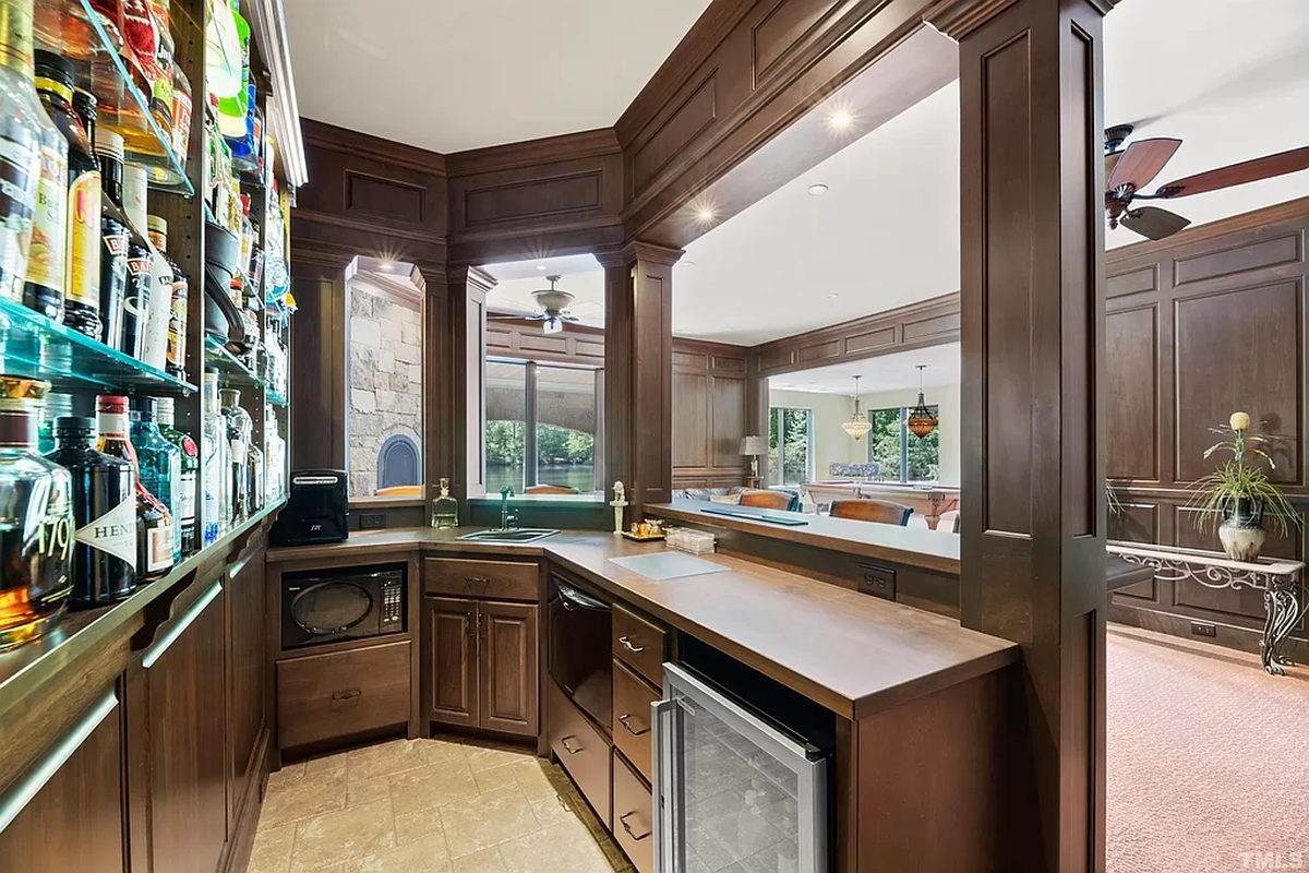 A pool table and built-in bar — which David Gardner calls the “pub” — are highlights of the entertainment space on the lowest floor.