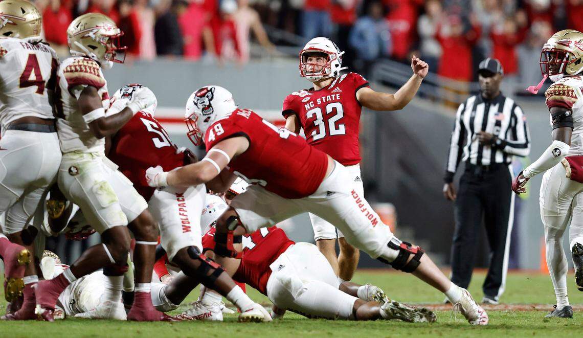 N.C. State’s Christopher Dunn (32) watches as he makes a 53-yard field goal during the second half of N.C. State’s 19-17 victory over Florida State at Carter-Finley Stadium in Raleigh, N.C., Saturday, Oct. 8, 2022.