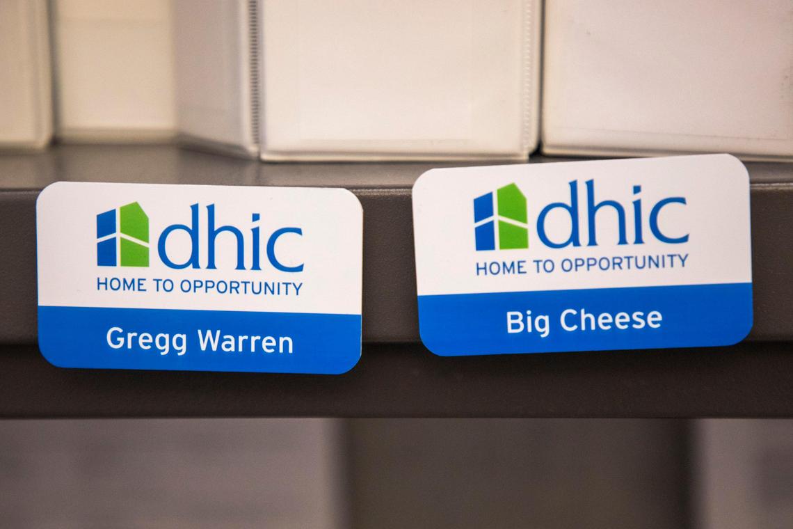 Name tags identifying Gregg Warren, president of DHIC for the past 34 years, developing affordable housing and assisting first-time homeowners across the state, hang in his office on Wednesday, Dec. 11, 2019, in Raleigh, NC. He plans to retire in the spring.