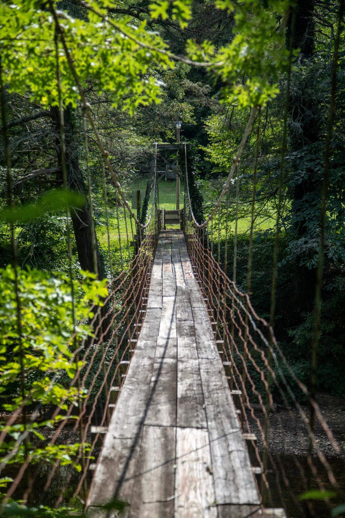 A suspension foot bridge spans the South Toe River