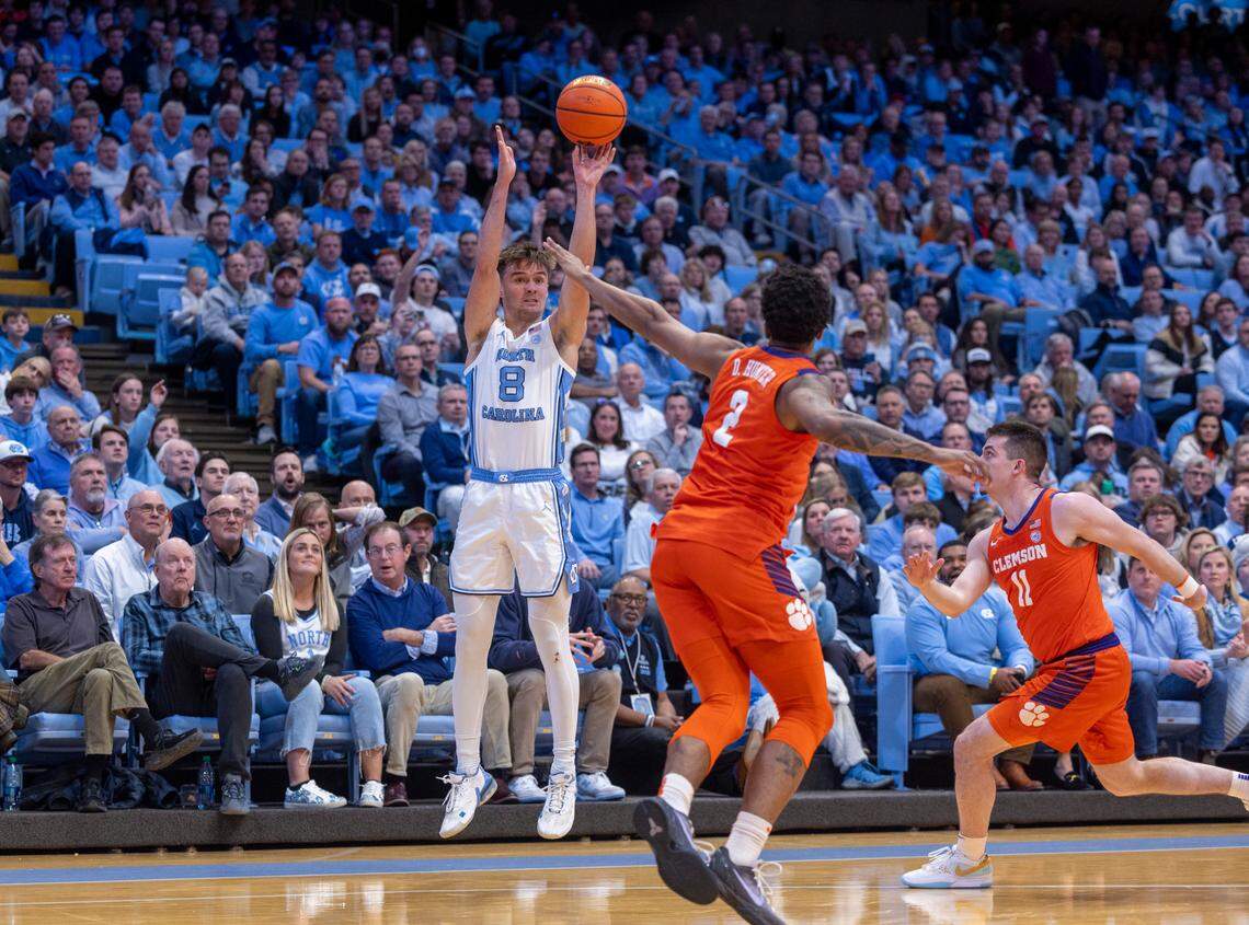 North Carolina’s Paxson Wojcik (8) launches a three-point shot in the first half against Clemson on Tuesday, February 6, 2024 at the Dean E. Smith Center in Chapel Hill, N.C.