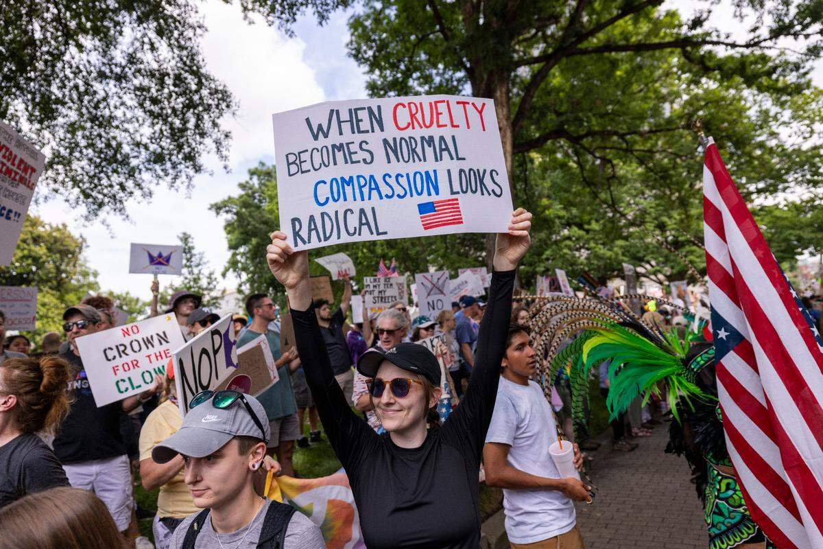 Hundreds of demonstrators rally at the North Carolina State Capitol on Saturday, June 14, 2025. The event was one of dozens held across the state and hundreds nationwide during what organizers called a nationwide day of defiance against the Trump administration.