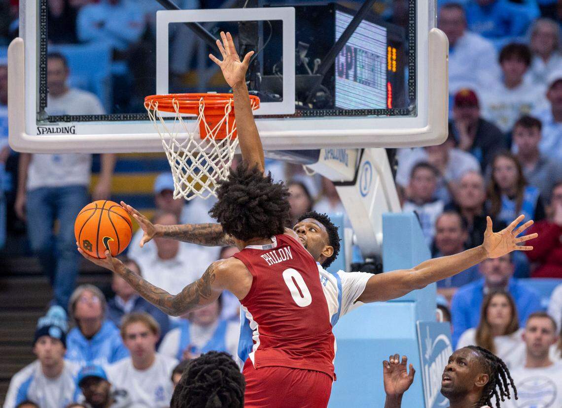 North Carolina forward Jalen Washington (13) defends Alabama guard Labaron Philon (0) in the second half on Wednesday, December 4, 2024 at the Smith Center in Chapel Hill, N.C.