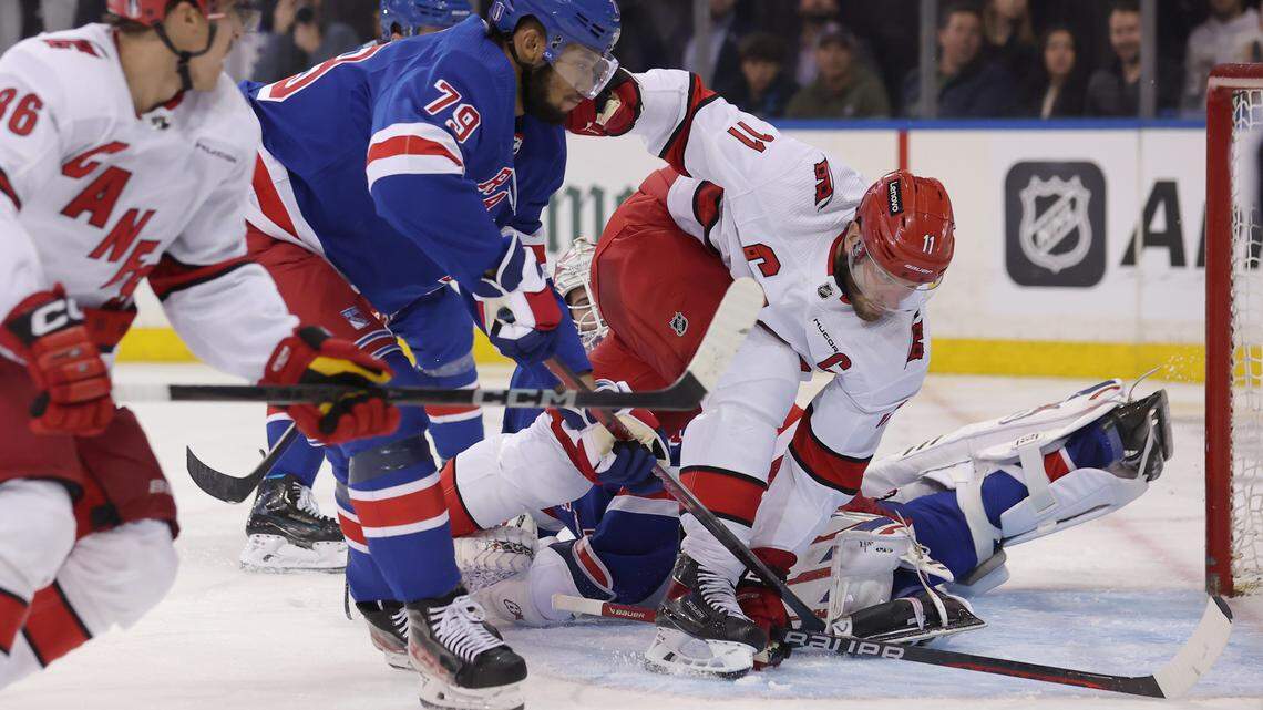 May 13, 2024; New York, New York, USA; Carolina Hurricanes center Jordan Staal (11) scores a goal against New York Rangers goaltender Igor Shesterkin (31) and defenseman K’Andre Miller (79) during the third period of game five of the second round of the 2024 Stanley Cup Playoffs at Madison Square Garden. Mandatory Credit: Brad Penner-USA TODAY Sports