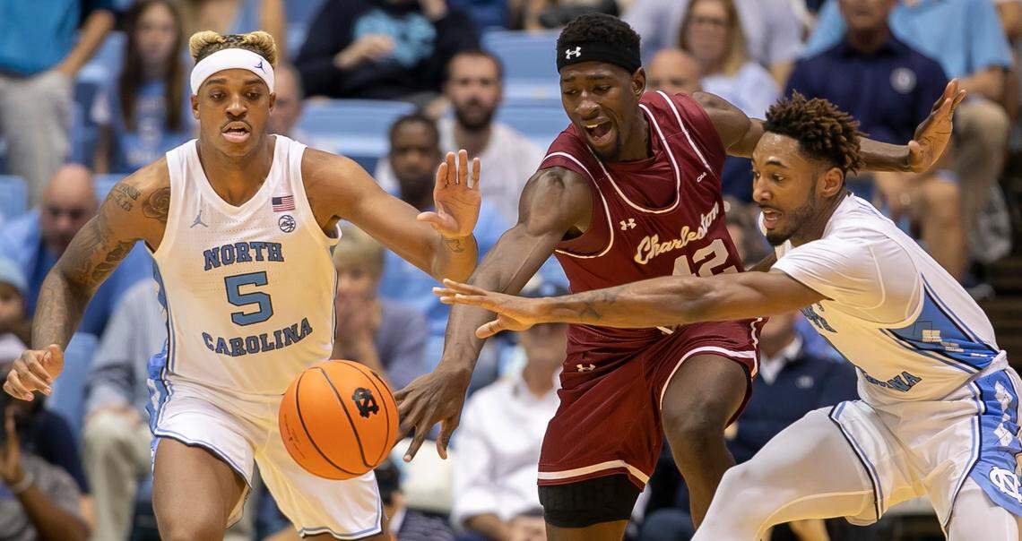 North Carolina’s Leaky Black (1) forces a turnover by College of Charleston’s Charles Lampten (42) during the second half on Friday, November 11, 2022 at the Smith Center in Chapel Hill, N.C.