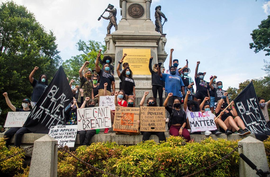 ÒIn honor of George FloydÓ reads the top of a plaque placed by members of a group called Raleigh United over a Confederate monument on Capitol grounds at the start of the 11th day of protests ignited by the death of George Floyd under the knee of a Minneapolis police officer and since evolved address a wide range of issues in the Black Lives Matter movement, resulting in reforms adopted by the Raleigh Police Department and a task force formed by Gov. Roy Cooper, on Wednesday, Jun. 10, 2020, in Raleigh, N.C.