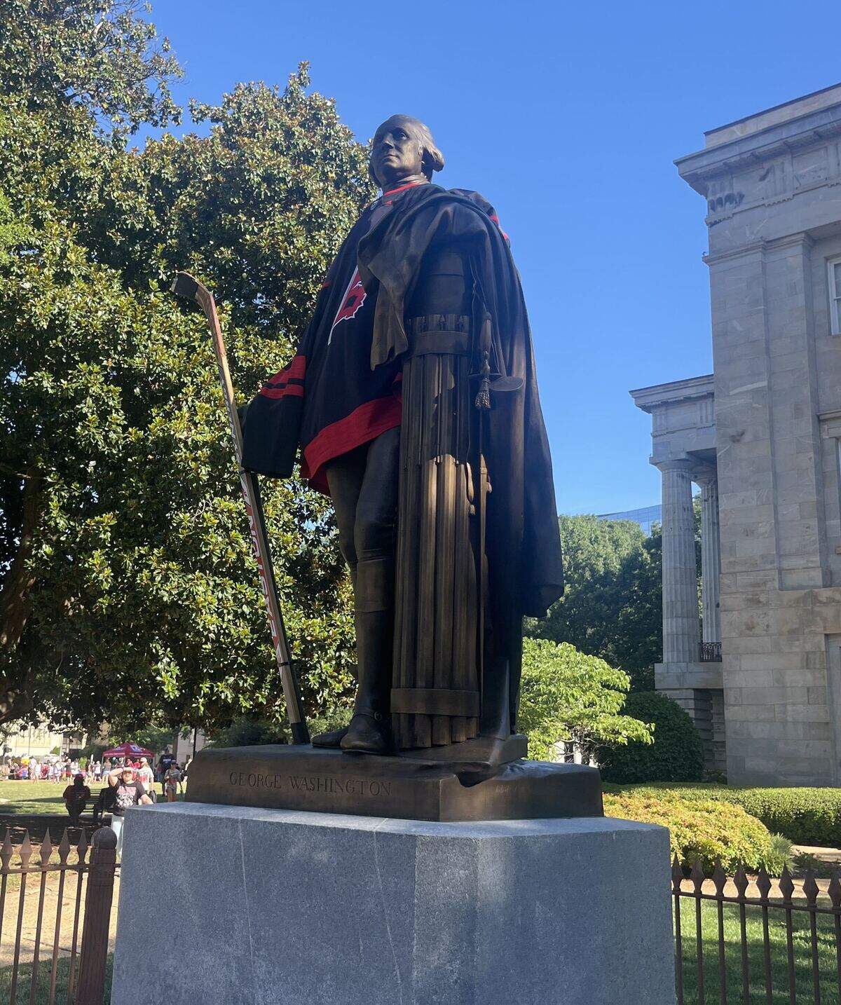 The statue of President George Washington near the North Carolina State Capitol was decorated Saturday morning in appropriate attire -- a Hurricanes jersey and carrying a hockey stick.