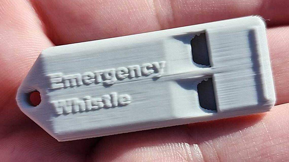 Volunteers passed out 3D printed "emergency whistles" at a Home Depot in Cary midday Wednesday. The whistles have been used by volunteers to alert people of nearby immigration enforcement.