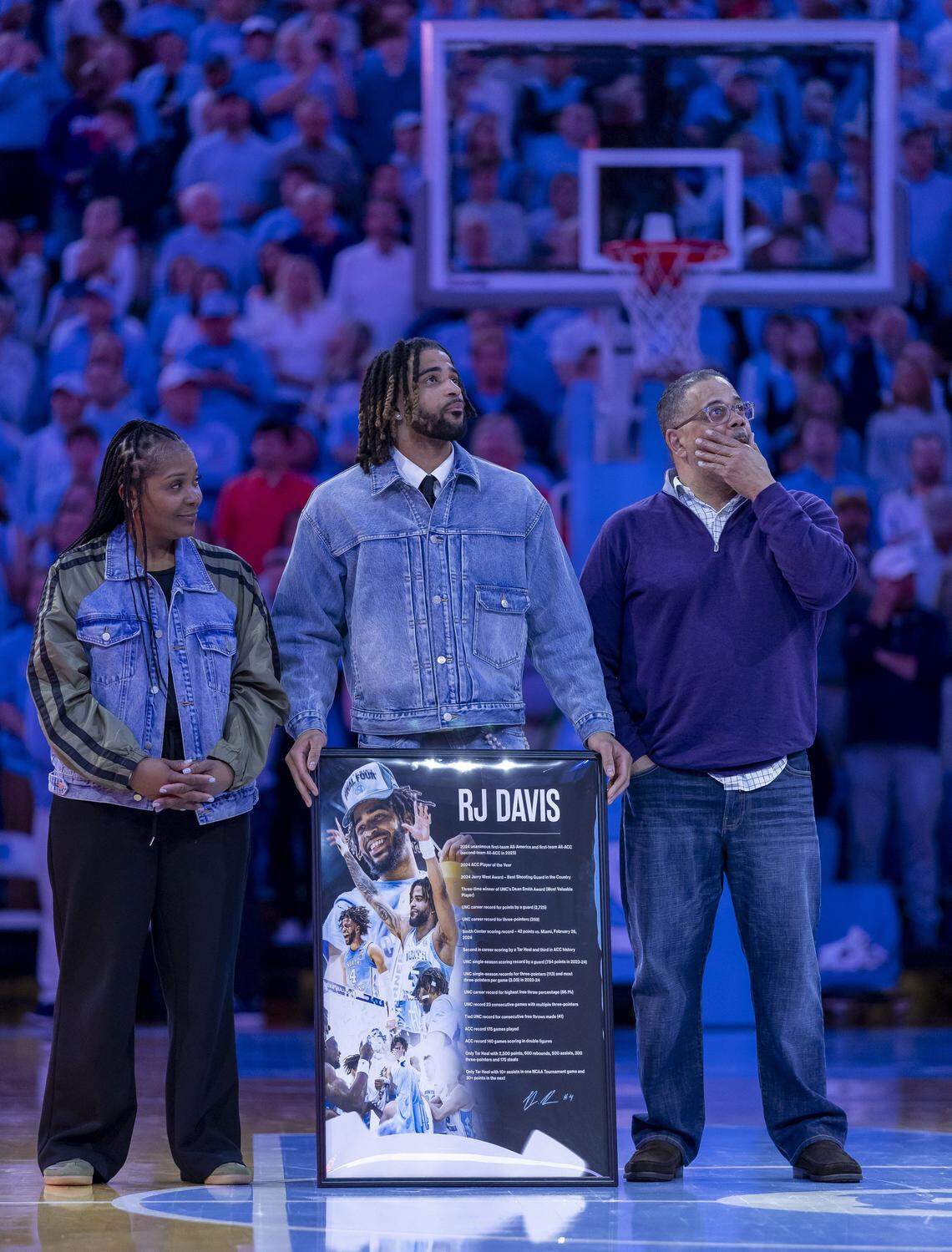 Former Tar Heel R.J. Davis is honored at halftime of the North Carolina vs Clemson game, as he has his jersey hung in the rafters of the Smith Center on Tuesday, March 3, 2026 in Chapel Hill, N.C.