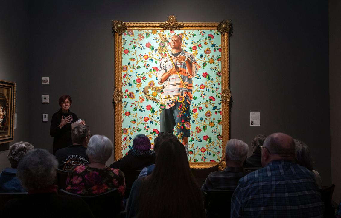 Maggie Griffin leads a group discussion about a piece of artwork on display at the Nasher Museum of Art with a monthly support group called ‘Reflections’ organized by the Duke Dementia Family Support Program, designed for both patients and caregivers to engage with works of art together while building a sense of community, on Wednesday, Jan. 8, 2020, in Durham, N.C.
