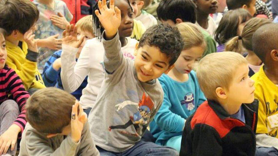 Adams Elementary School students take part in a rally to kick off the Cary school’s reading challenge in this 2014 file photo. Jonathan Hegedus was appointed to be the school's new prinicipal.