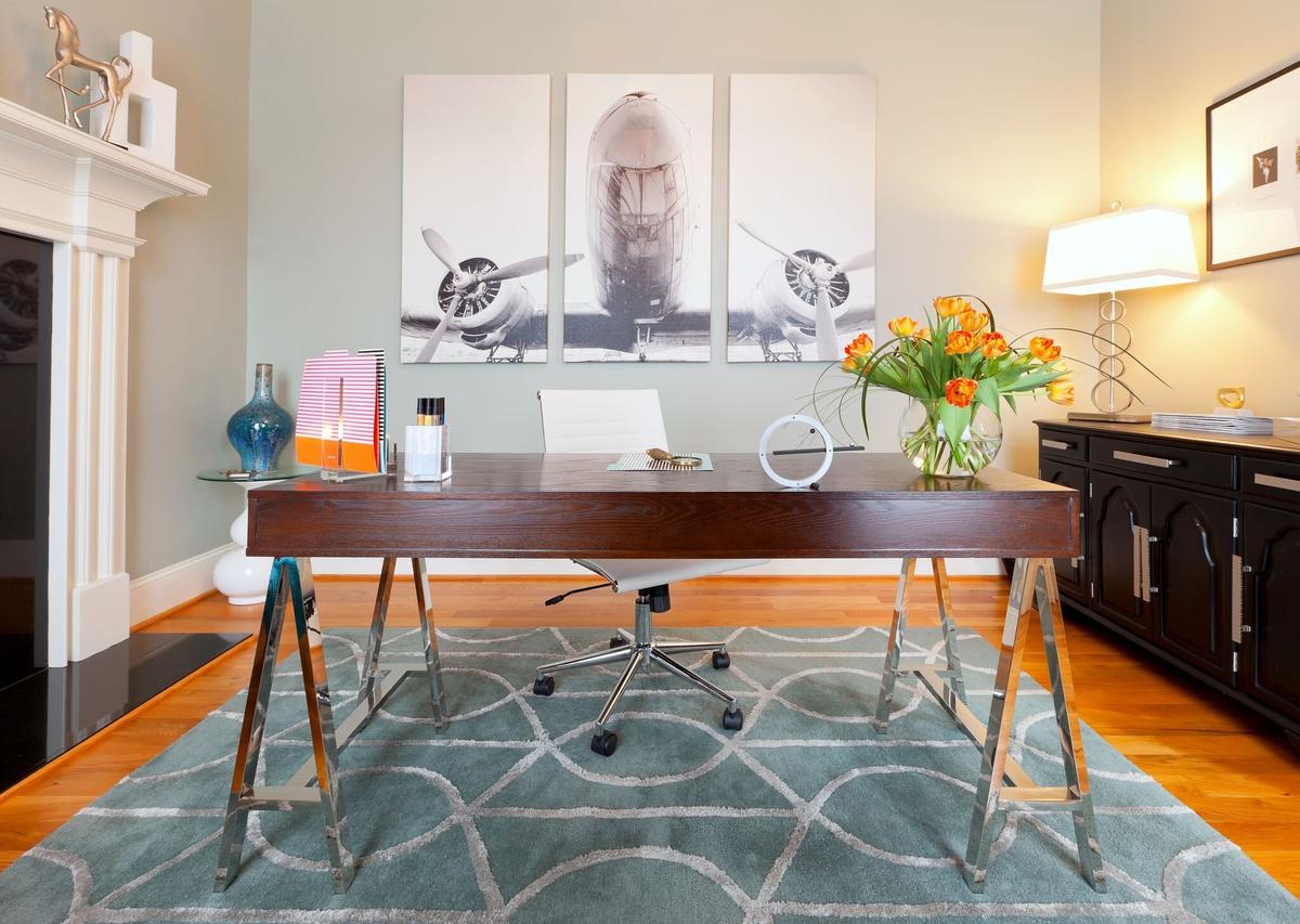 This oversized tryptic of an airplane portrays our client’s love for planesand travel and helps drive the design of the space.