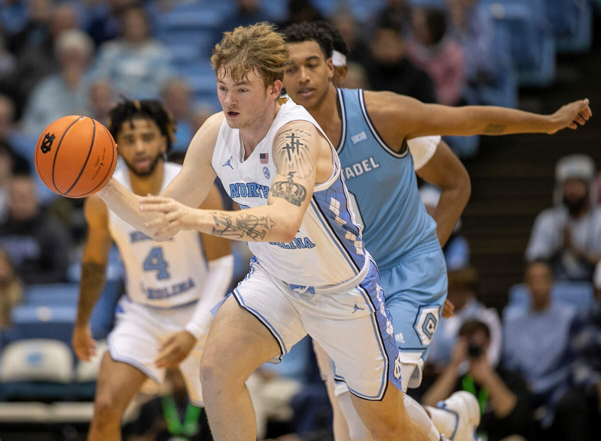 North Carolina’s Tyler Nickel (24) starts a fast break after making a steal from The Citadel’s Jackson Price (0) in the second half on Tuesday, December 13, 2022 at the Smith Center in Chapel Hill, N.C.