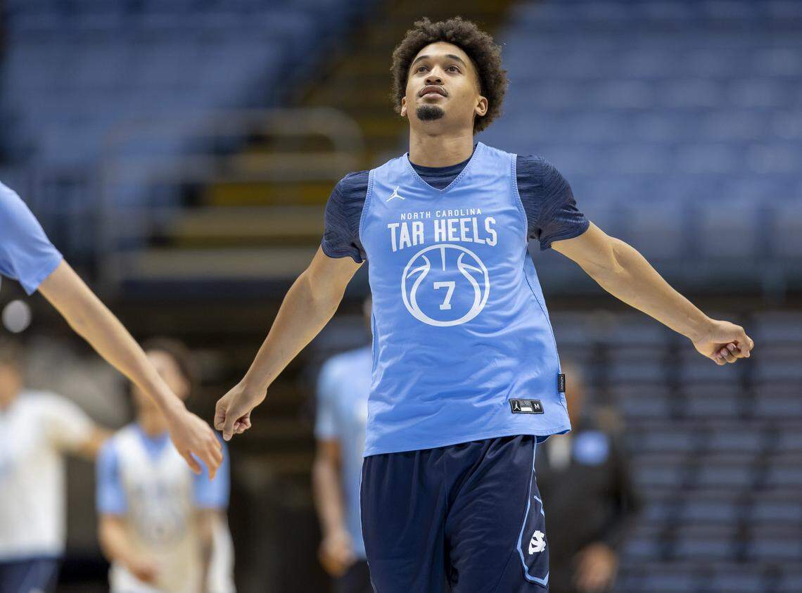 North Carolina guard Seth Trimble (7) stretches during practice on Thursday, October 9. 2025 at the Smith Center in Chapel Hill, N.C.