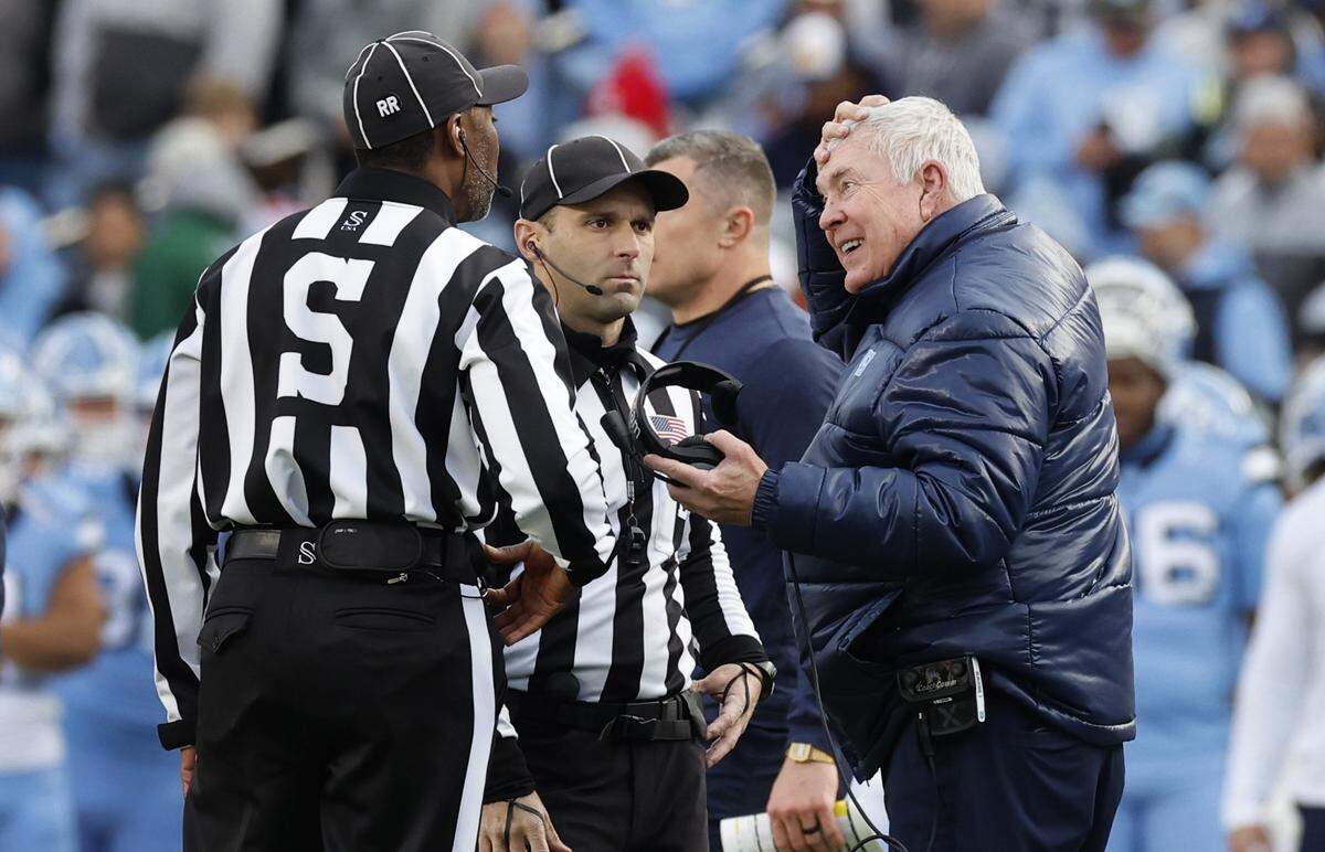 North Carolina head coach Mack Brown argues with the officials during the first half of N.C. State’s game against UNC at Kenan Stadium in Chapel Hill, N.C., Saturday, Nov. 30, 2024.