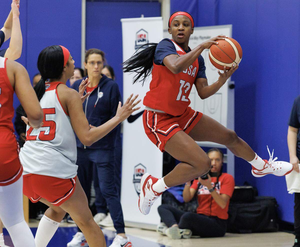 Jackie Young saves a ball from going out of bounds as players scrimmage during USA Basketball Women’s National Team training camp on Friday, Dec. 12, 2025, in Durham, N.C.