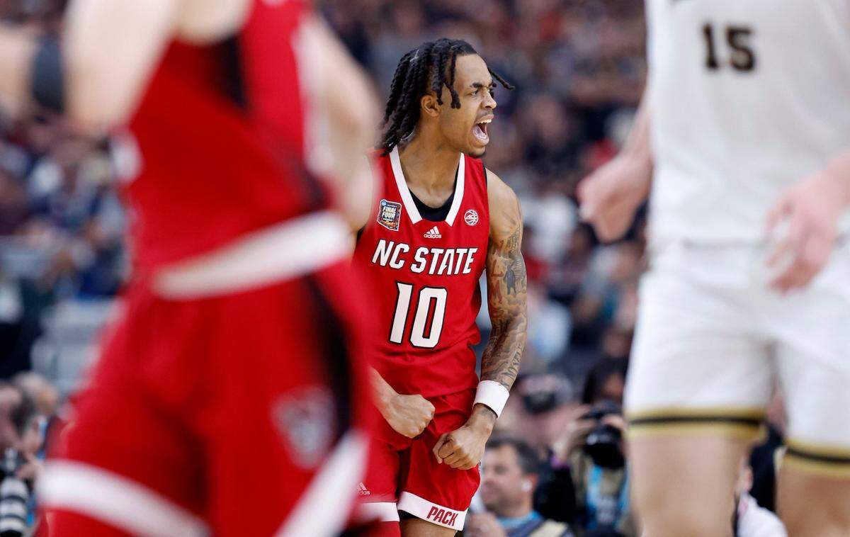N.C. State’s Breon Pass (10) celebrates hitting a basket during the first half of N.C. State’s game against Purdue in the NCAA Tournament national semfinals at State Farm Stadium in Glendale, Ariz., Saturday, April 6, 2024.