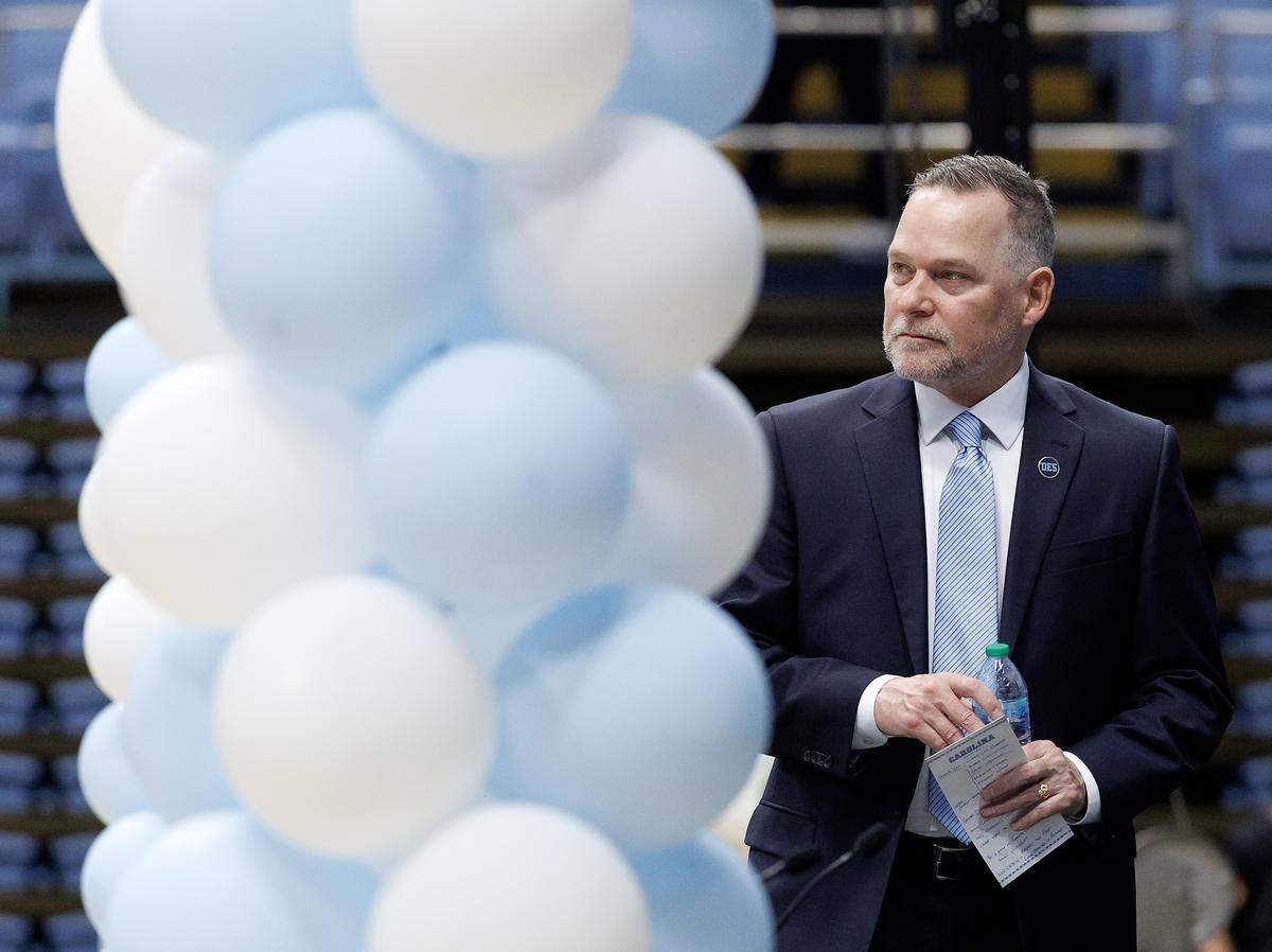 New North Carolina men’s basketball head coach Michael Malone looks out on the crowd following an introductory press conference at the Smith Center on Tuesday, April 7, 2026, in Chapel Hill, N.C. 