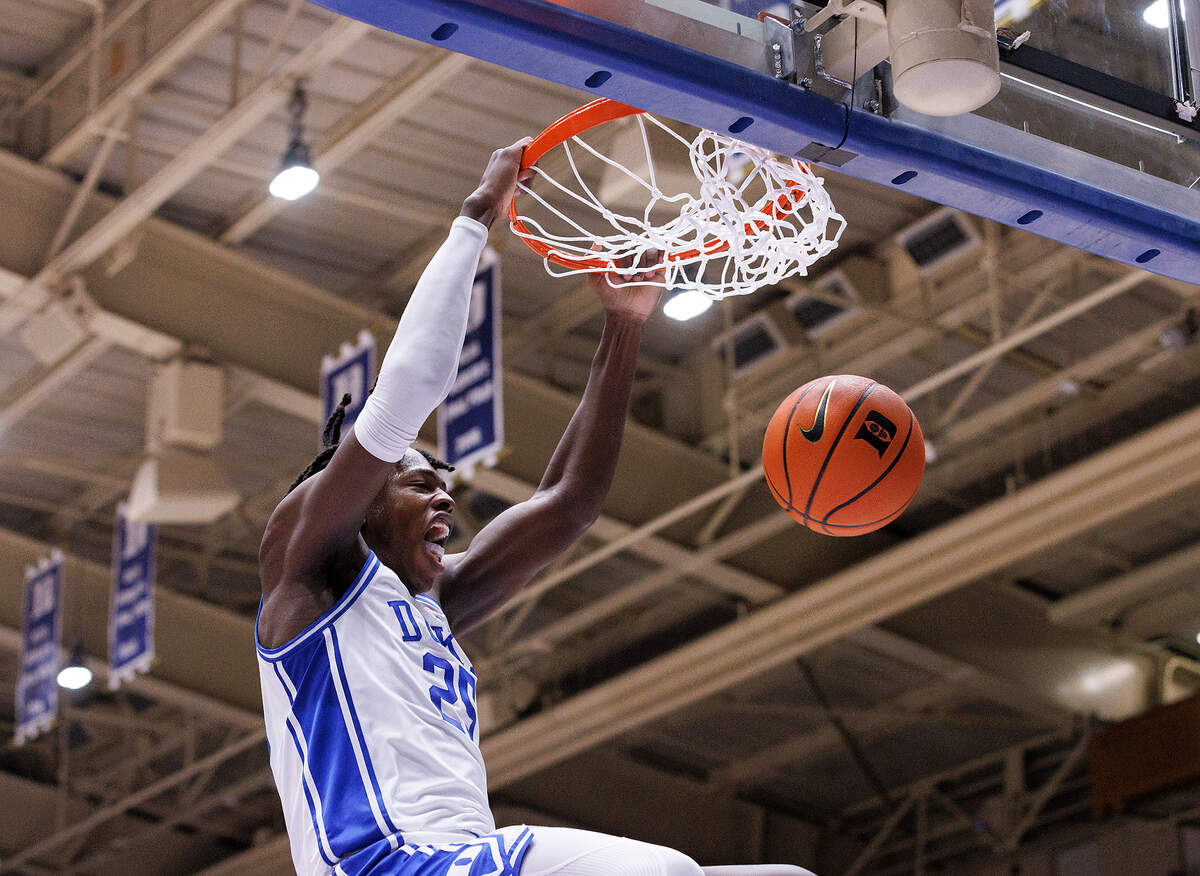 Duke’s Mark Mitchell slams in two during the second half of the Blue Devils’ 89-68 win over Hofstra on Tuesday, Dec. 12, 2023, at Cameron Indoor Stadium in Durham, N.C.