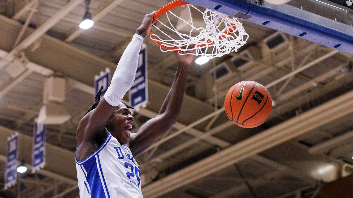 Duke’s Mark Mitchell slams in two during the second half of the Blue Devils’ 89-68 win over Hofstra on Tuesday, Dec. 12, 2023, at Cameron Indoor Stadium in Durham, N.C.