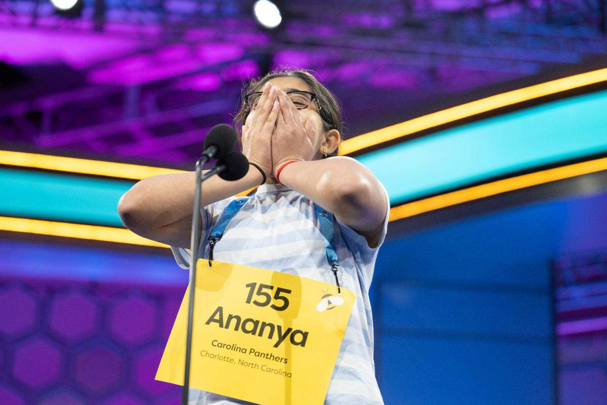 Ananya Rao Prassanna reacts with joy after successfully spelling a word in the Semifinals of the 2024 Scripps National Spelling Bee on May 29, 2024. Prassanna, a student at Davis Drive Middle School in Cary. N.C., is one of eight spellers to qualify for the finals.