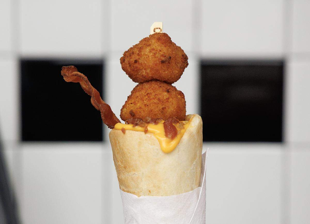 A Bacon Mac & Cheese Cone from Kona Pizza is pictured at the 2025 N.C. State Fair media day on Monday, Oct. 13, 2025, at Dorton Arena in Raleigh, NC. 