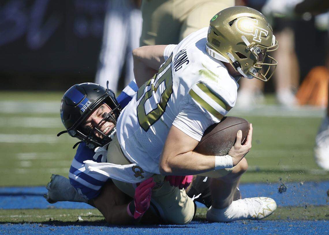 Duke linebacker Luke Mergott sacks Georgia Tech quarterback Haynes King during the first half of the Blue Devils’ game on Saturday, Oct. 18, 2025, at Wallace Wade Stadium in Durham, N.C.