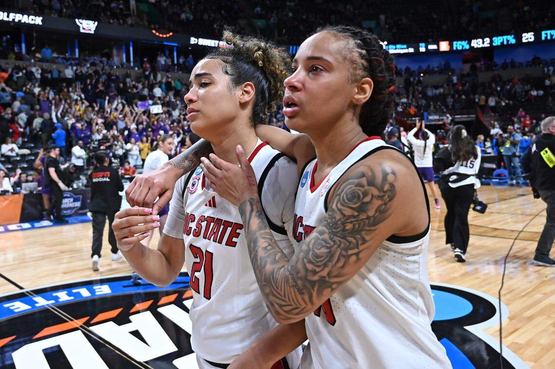 NC State Wolfpack guards Madison Hayes (21) and Aziaha James (10) walk off the court during of a Sweet 16 NCAA Tournament basketball game against the LSU Lady Tigers at Spokane Arena.