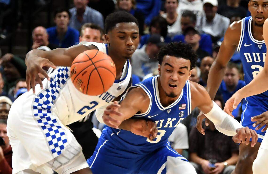 Duke guard Tre Jones (3) and Kentucky guard Ashton Hagans (2) vie for a loose ball in the first half of play at the Bankers Life Fieldhouse in Indianapolis, Indiana, Tuesday, Nov. 6, 2018.