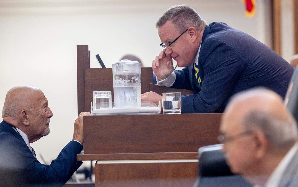 Rep. Joe John, a Wake County Democrat left, speaks with House Speaker Tim Moore Thursday, Sept. 21, 2023, after the House concluded the first of several votes on the budget at the General Assembly.