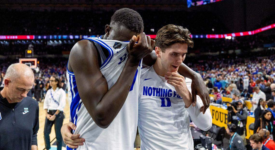 Duke centers Khaman Maluach (9) and Neal Begovich (20) leave the court following the Blue Devils’ 70-67 loss to Houston on Saturday, April 5, 2025 in the NCAA national semi final game at the Alamodome in San Antonio, TX.