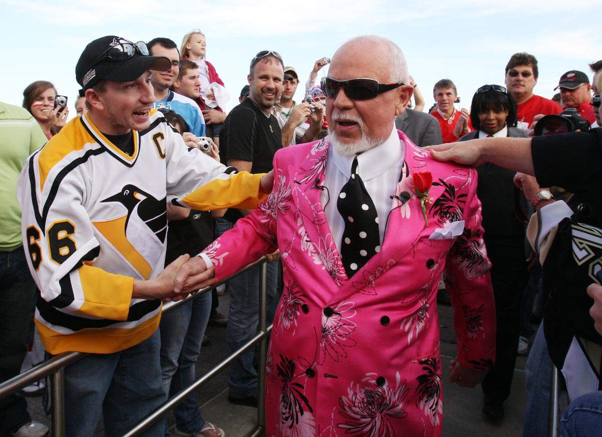 Don Cherry, announcer on CBC’s “Hockey Night in Canada,” is greeted by fans as he arrives for Game 2 of the NHL hockey Stanley Cup finals between the Pittsburgh Penguins and the Detroit Red Wings in Detroit, Sunday, May 31, 2009.
