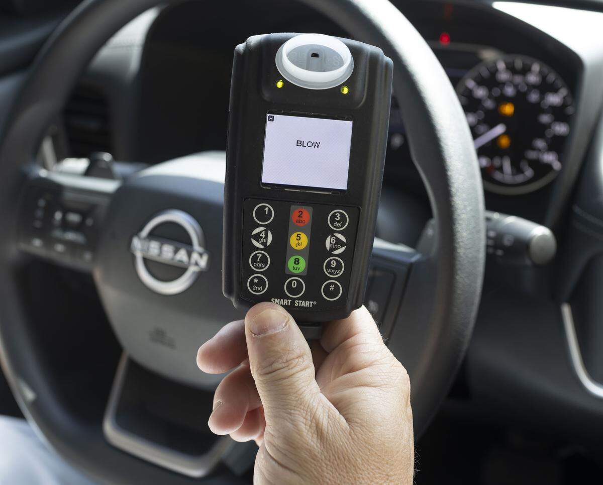 Jason Deas, demonstrates an Ingnition Interlock Device, that monitors alcohol use, preventing an impaired driver from starting a vehicle, on Wednesday, May 13, 2026 at the General Assembly in Raleigh, N.C. 