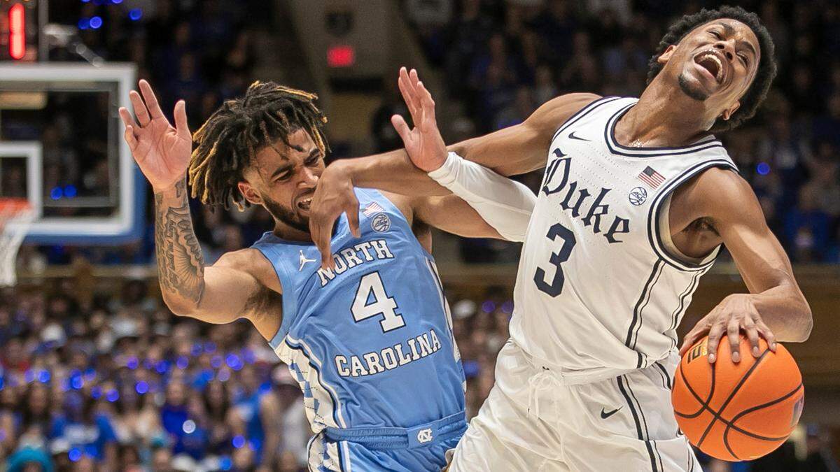 North Carolina’s R.J. Davis (4) is called for a foul against Duke’s Jeremy Roach (3) in the first half on Saturday, February 4, 2023 at Cameron Indoor Stadium in Durham, N.C.