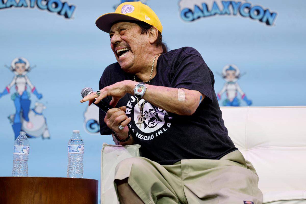 Danny Trejo laughs while answering questions during a Q&A at GalaxyCon Raleigh at the Raleigh Convention Center Sunday, July 28, 2024.
