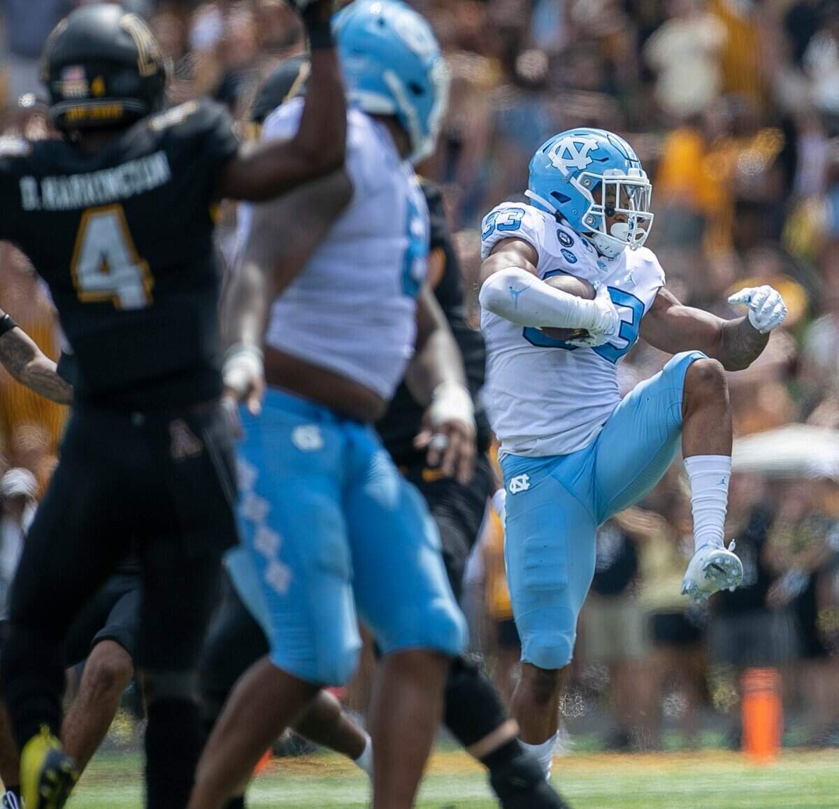 North Carolina linebacker Cedric Gray (33) intercepts a pass by Appalachian State quarterback Chase Brice (7) in the third quarter on Saturday, September 3, 2022 at Kidd Brewer Stadium in Boone, N.C.