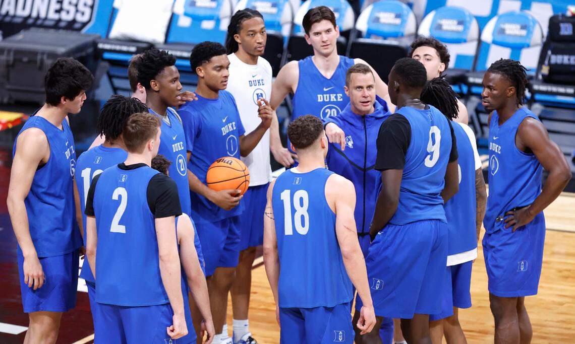 Duke head coach Jon Scheyer huddles with the team during Duke’s open practice at the Lenovo Center in Raleigh, N.C., Thursday, March 20, 2025. The Blue Devils will face Mount St. Mary’s in the first round of the NCAA Tournament Friday.