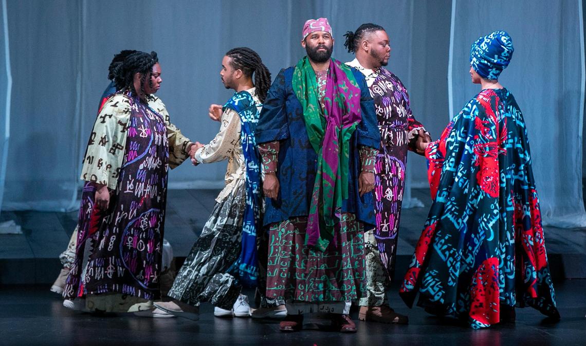 Omar, played by Jamez McCorkle, center, during a dress rehearsal on Wednesday, February 22, 2023 at Memorial Hall in Chapel Hill, N.C. The opera by Rhiannon Giddens and Michael Abels will be performed on February 25-26 in Chapel Hill.