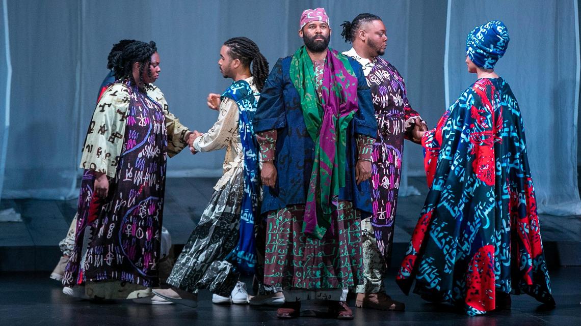 Omar, played by Jamez McCorkle, center, during a dress rehearsal on Wednesday, February 22, 2023 at Memorial Hall in Chapel Hill, N.C. The opera by Rhiannon Giddens and Michael Abels will be performed on February 25-26 in Chapel Hill.