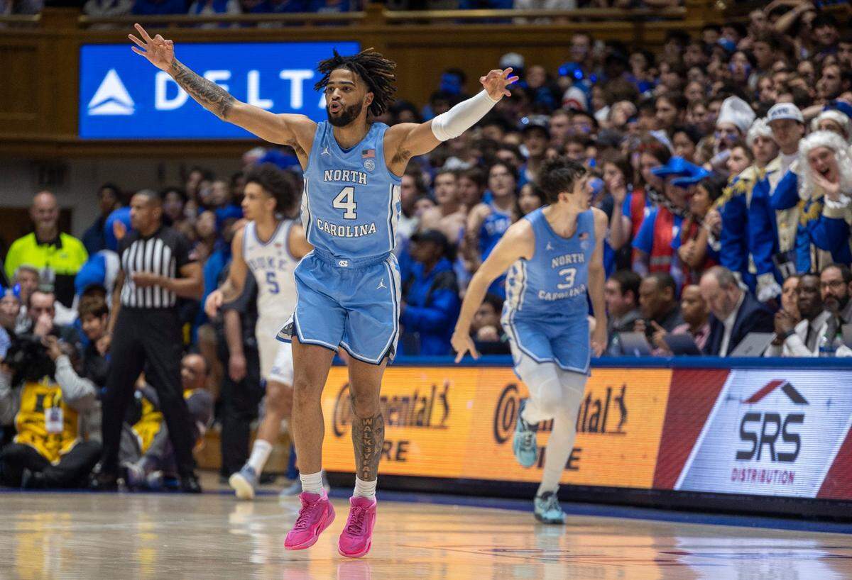 North Carolina’s R.J. Davis (4) reacts after a three-point basket by teammate Cormac Ryan (3) during the first half against Duke on Saturday, March 9, 2024 at Cameron Indoor Stadium in Durham, N.C.