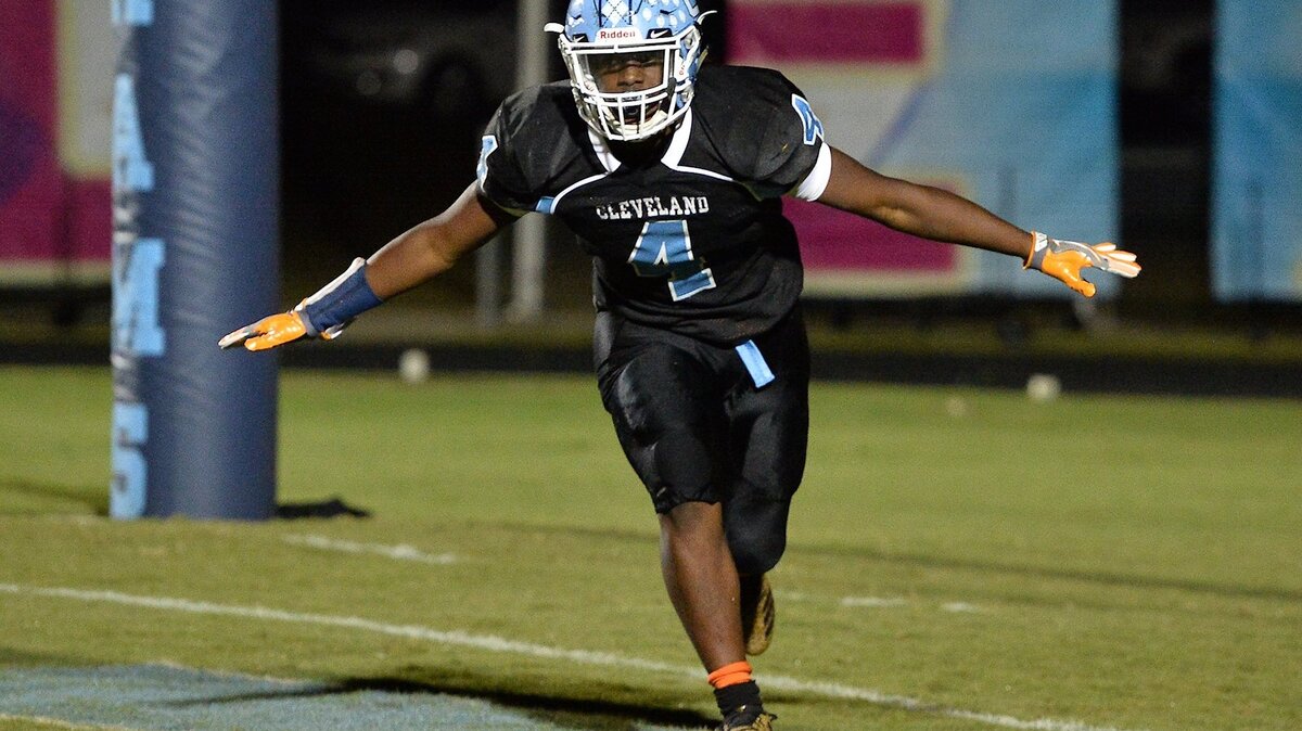 Cleveland’s Tyson Dew (4) celebrates after scoring the touchdown during the first quarter. The Clayton Comets and Cleveland Rams met in a regular season Greater Neuse River conference game in Clayton N.C. on October 19, 2018.