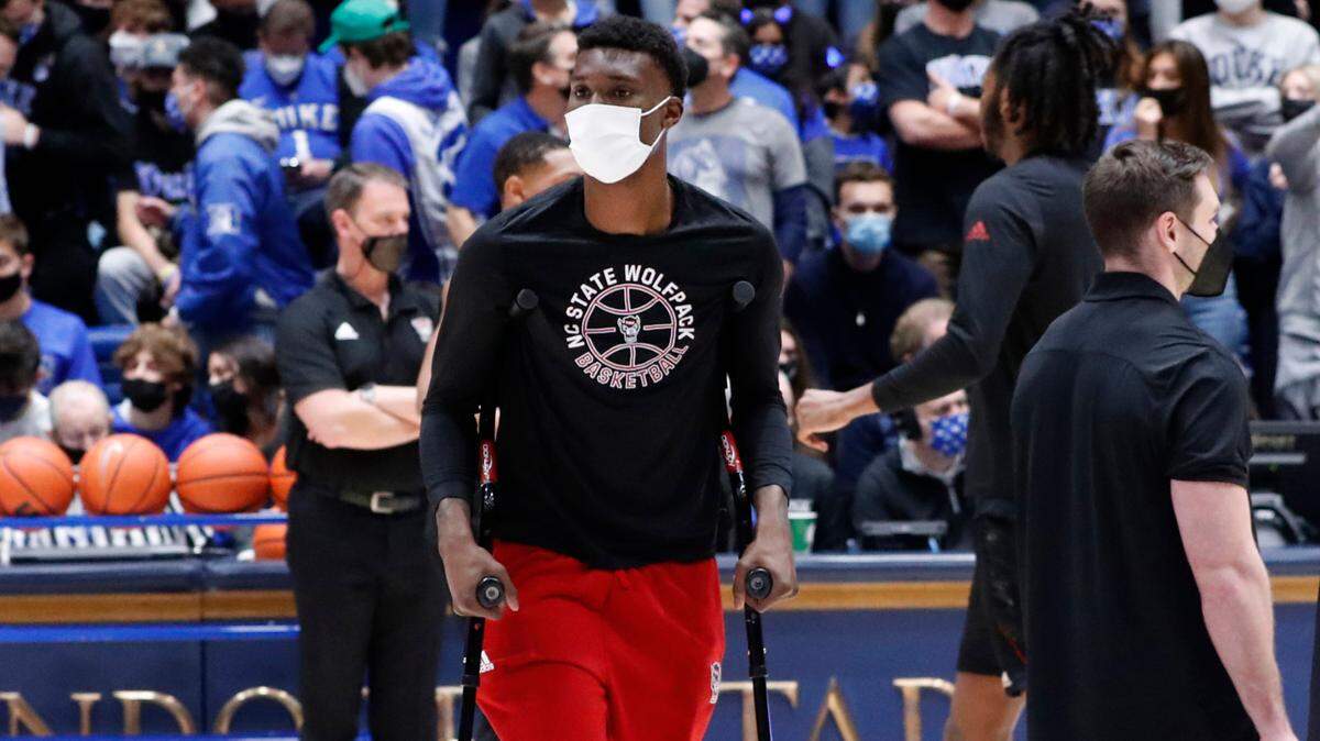 N.C. State’s Ernest Ross watches the warmups before Duke’s game against N.C. State at Cameron Indoor Stadium in Durham, N.C., Saturday, January 15, 2022.