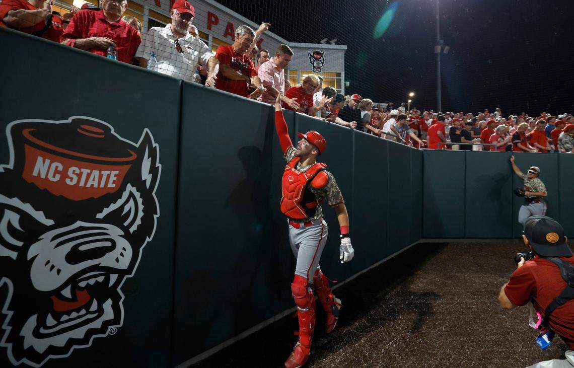 N.C. State’s Jacob Cozart (14) thanks fans after N.C. State’s 5-3 victory over James Madison in the NCAA Raleigh Regional final at Doak Field Sunday, June 2, 2024.
