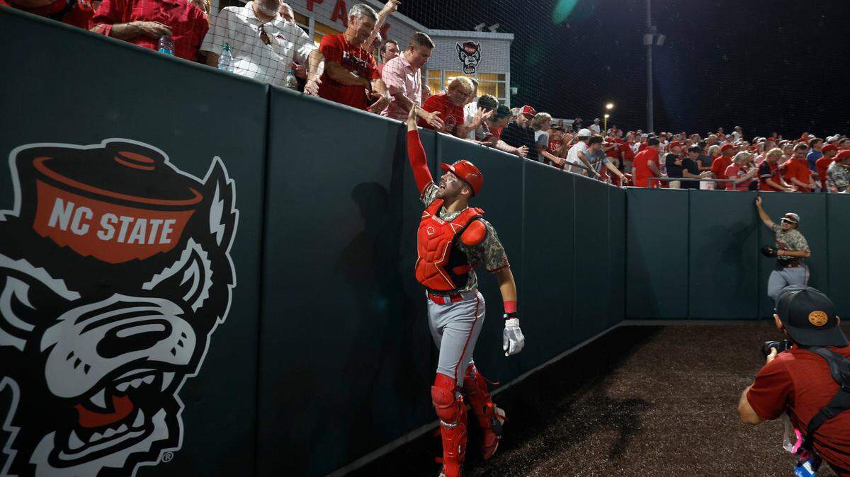N.C. State’s Jacob Cozart (14) thanks fans after N.C. State’s 5-3 victory over James Madison in the NCAA Raleigh Regional final at Doak Field Sunday, June 2, 2024.
