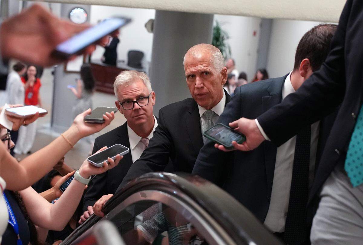 Sen. Thom Tillis talks to reporters while walking to the Senate chamber at the U.S. Capitol on June 25, 2025 in Washington, DC, as Republican lawmakers worked to complete passage of the One Big, Beautiful Bill.