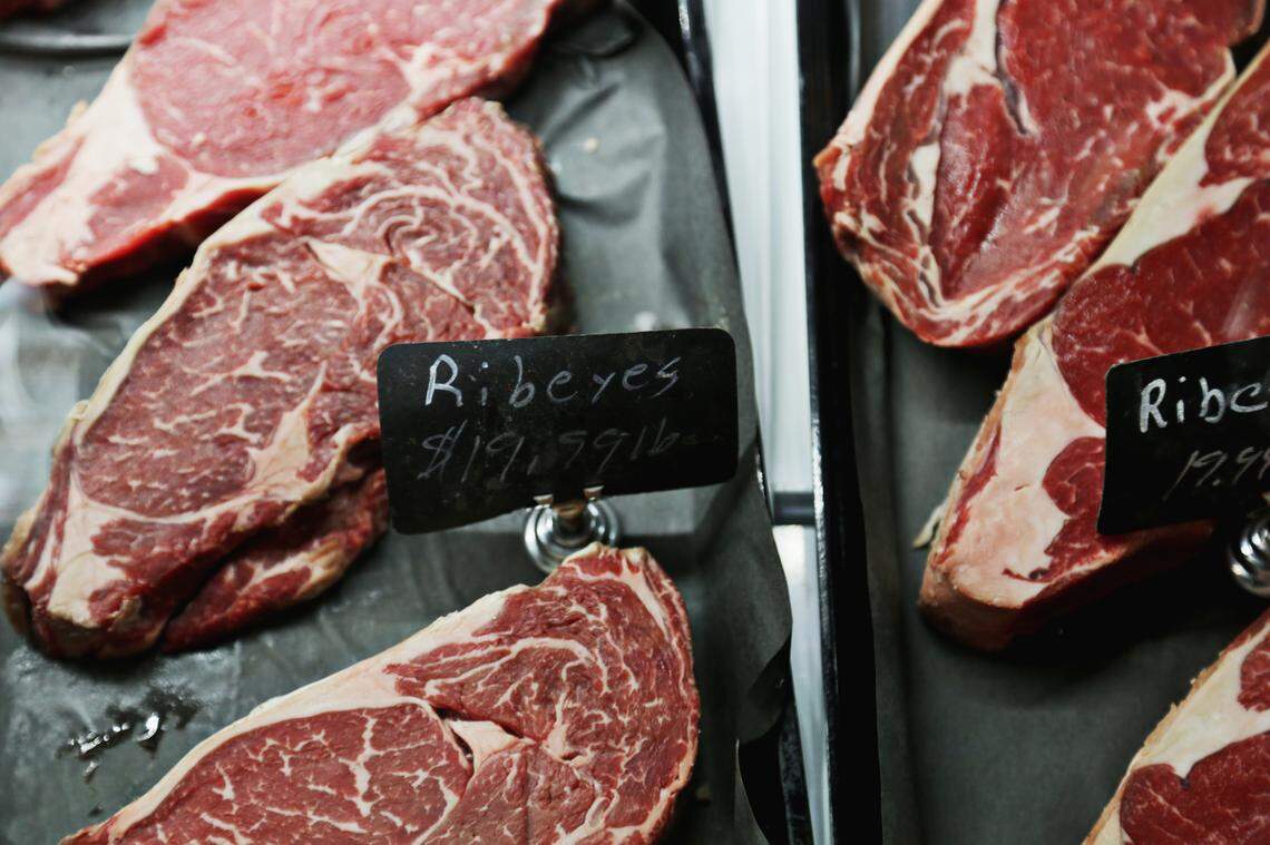 Hefty cuts of fresh meat are displayed like jewels in the glass butcher case at the back of Whiskey Pig Craft Butchery and Deli in nearby Kinston.
