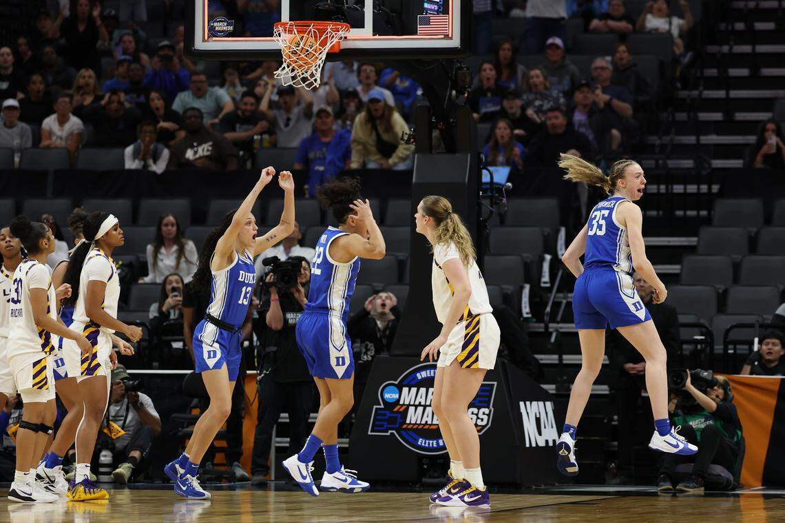 Jordan Wood (13), Taina Mair (22) and Toby Fournier (35)of the Duke Blue Devils celebrate after a shot by Ashlon Jackson (not pictured) goes in the net with no time left on the clock at the end of the teams’ 2026 NCAA Women’s Basketball Tournament Sweet 16 game at Golden 1 Center on March 27, 2026 in Sacramento, California.