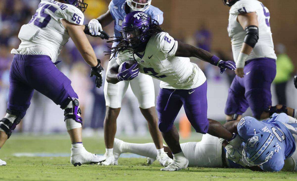 TCU running back Kevorian Barnes (2) gains yards during the first half of UNC’s game against TCU at Kenan Stadium in Chapel Hill, N.C., Monday, Sept. 1, 2025.