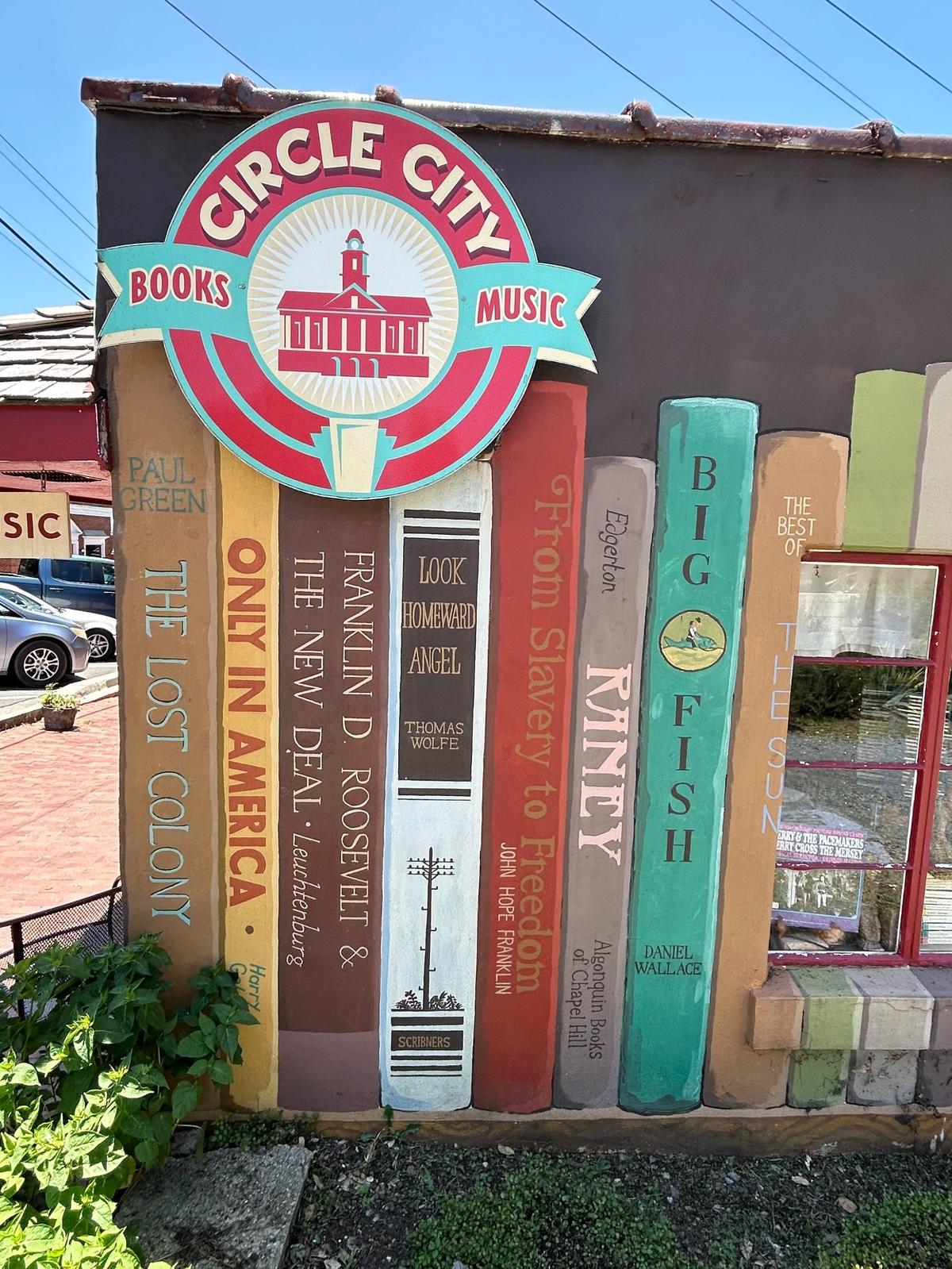 Circle City Bookstore in Pittsboro with its signature bookshelf wall mural.